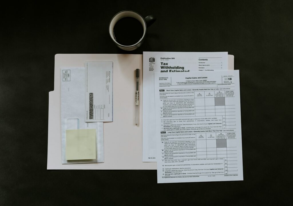 Invoice paperwork on a small business desk, part of a plan for getting paid faster