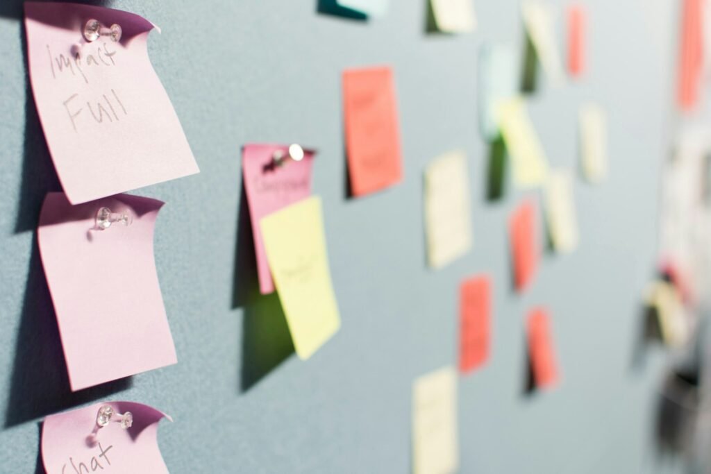 Colorful sticky notes representing different QuickBooks alternatives to weigh