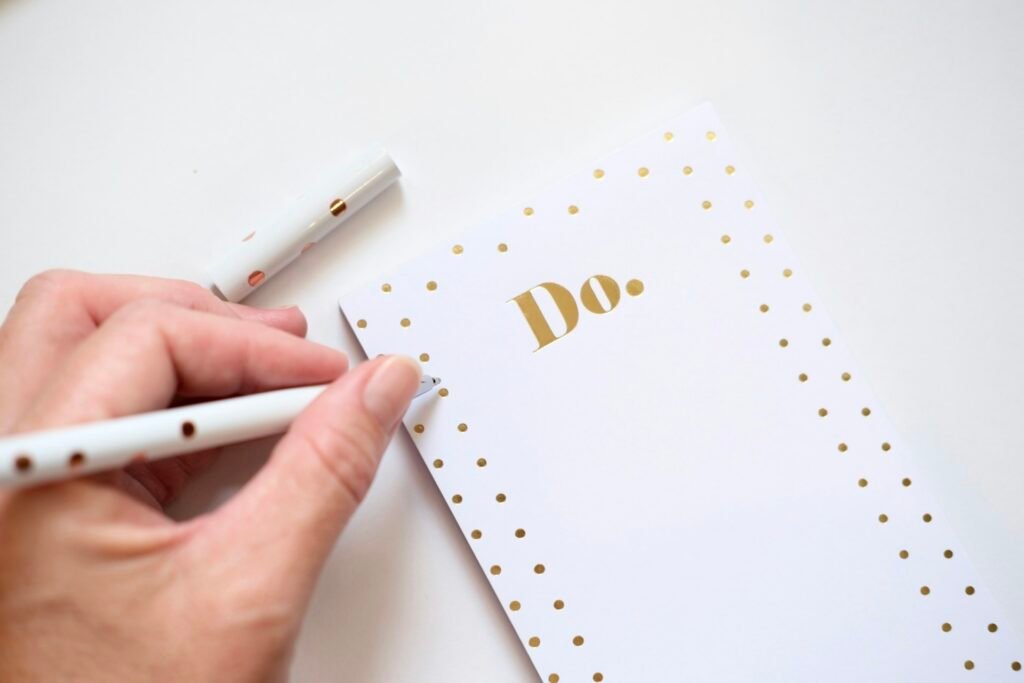 Handwritten checklist, part of a QuickBooks setup guide for beginners