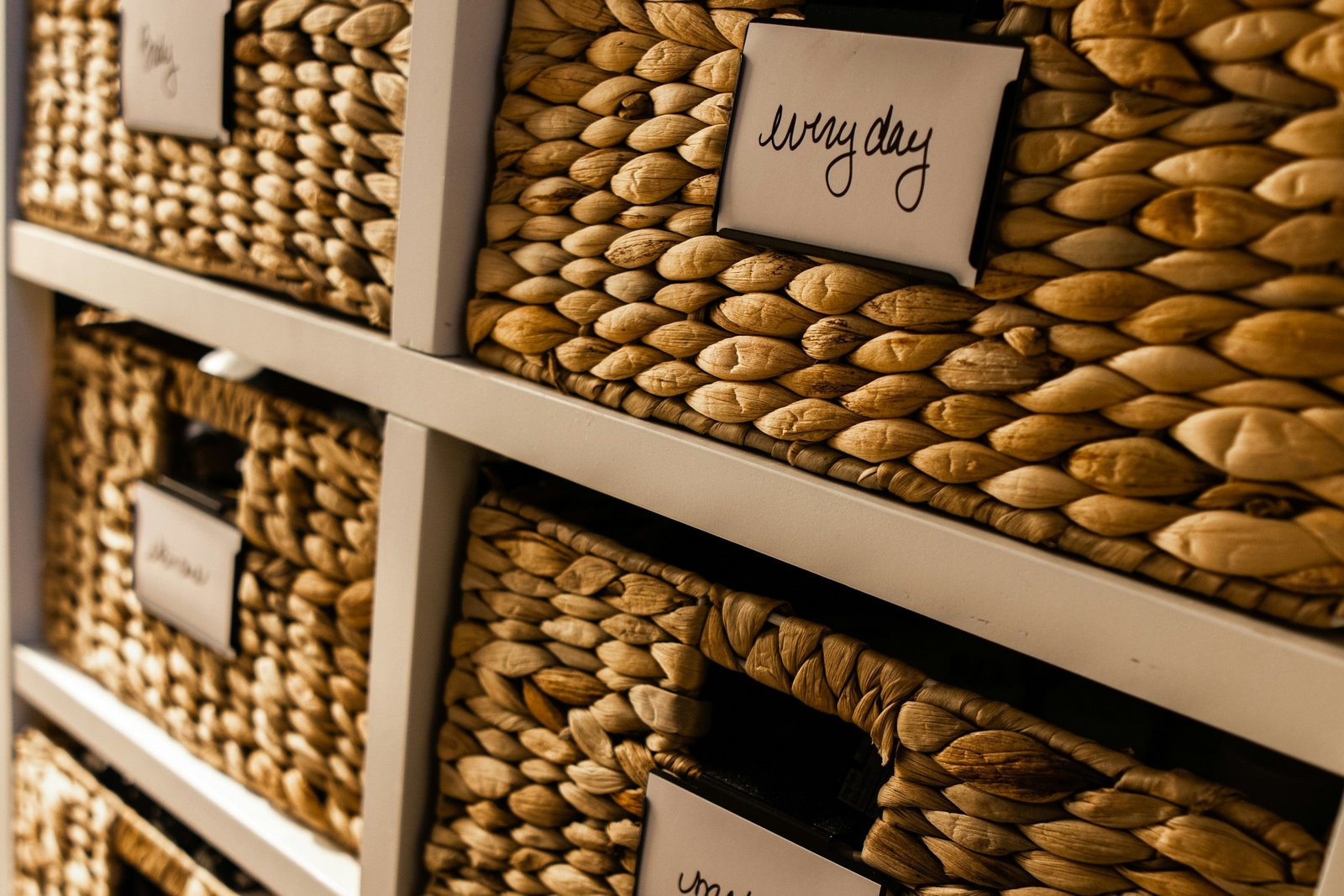 Close-up of labeled drawers, representing how to categorize transactions in QuickBooks
