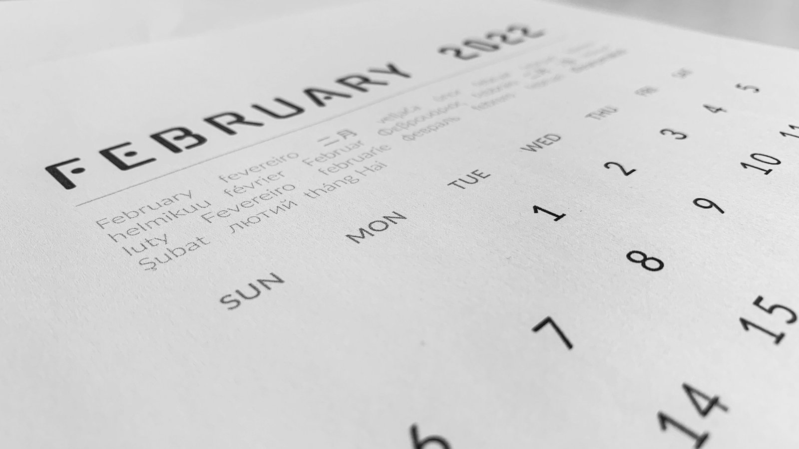 A close-up of a calendar on a table